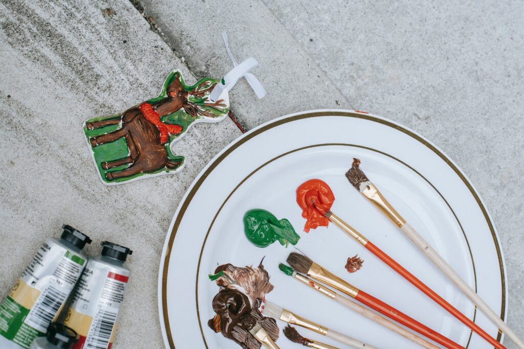 Art supplies including paint and paint brushes to make an ornament | DIY gift ideas | Merely Creative, Martinsburg WV